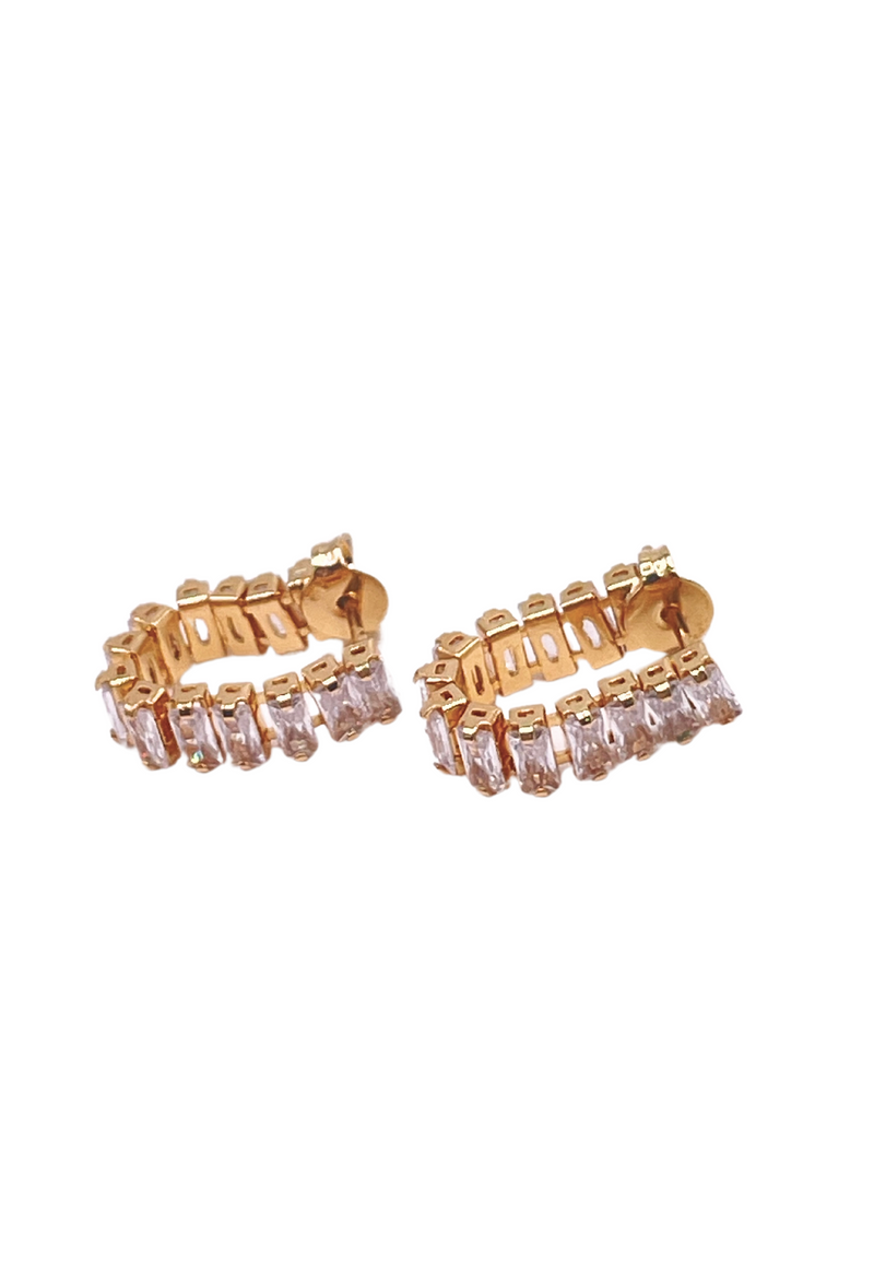 18k gold huggie earrings with baguette cubic zirconia stones, showcasing timeless elegance and comfort in style.