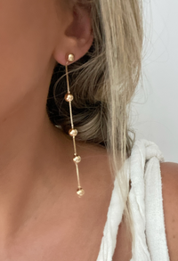 Elegant gold bead and gold-filled dangle earrings, perfect for special occasions or everyday wear