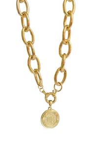 Elevate your everyday look with our Chunky Rolo Chain featuring a stunning zodiac coin. Crafted in 18k gold fill, this necklace is designed for the modern woman who loves versatile, statement pieces. Whether worn alone for a sleek, bold vibe or layered with your favorite chains, it’s the perfect blend of personal and chic.