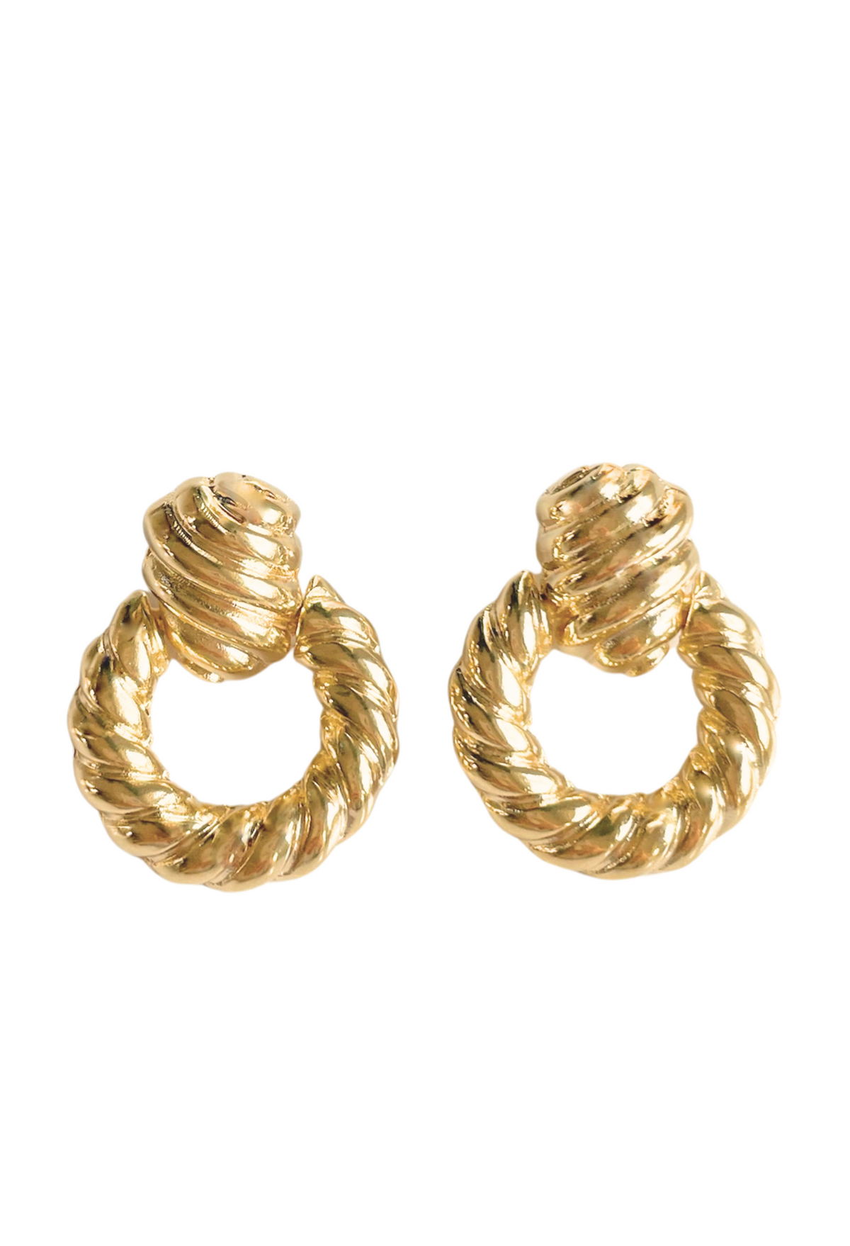 Introducing our "Knock Out" Earrings—a modern twist on the classic doorknocker. Crafted in 18k gold-filled with a chic croissant texture, these earrings make a statement that’s bold yet wearable. Designed with a secure stud backing for all-day comfort, they're the effortlessly stylish piece you'll never want to take off.