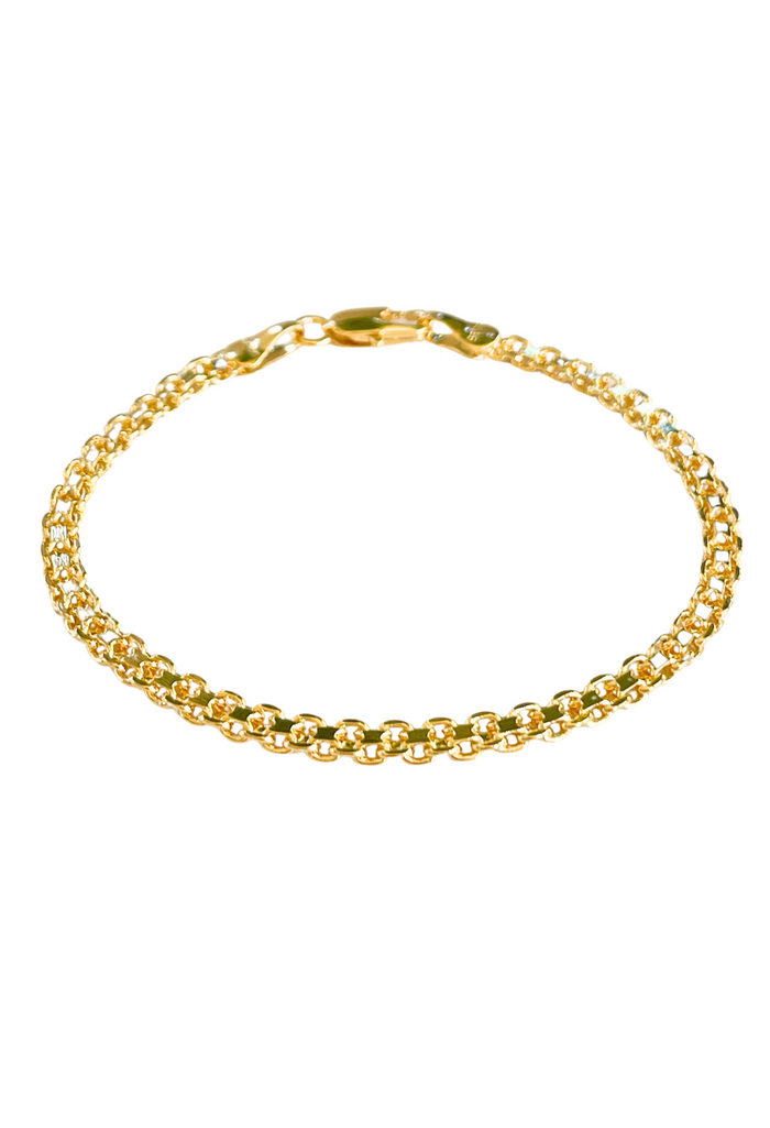 A timeless addition to your bracelet stack, the Crawford Bismark Bracelet features a sleek, polished bar on a delicate gold chain. Effortlessly elegant and designed for everyday wear, it’s the perfect balance of modern minimalism and classic shine.