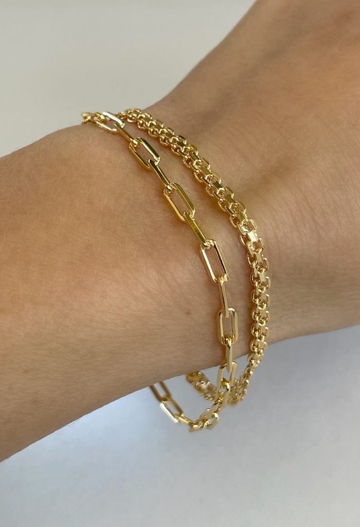 A timeless addition to your bracelet stack, the Crawford Bismark Bracelet features a sleek, polished bar on a delicate gold chain. Effortlessly elegant and designed for everyday wear, it’s the perfect balance of modern minimalism and classic shine.