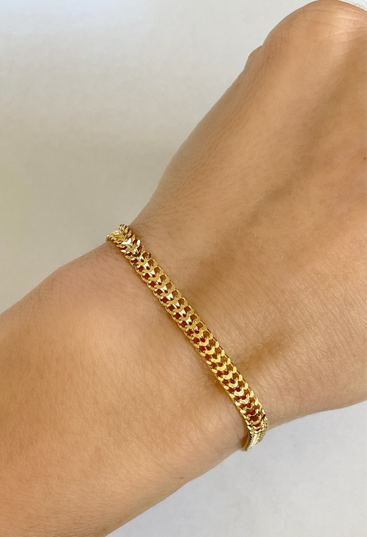 The Double Curb Bracelet is your perfect everyday bracelet. Crafted in 18k gold-filled for timeless shine, this effortlessly chic chain stands out solo or layers beautifully with your favorite pieces.

18k Gold Filled Over Brass
6.5" or 7" Length, 4mm Width&nbsp;
Lightweight &amp; Stackable