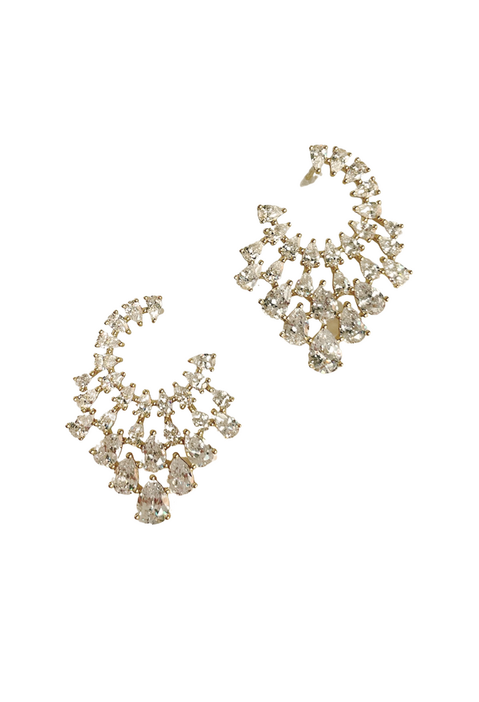 Our Sunburst Earrings dazzle with gold-filled elegance and sparkling cubic zirconia, perfect for making any occasion unforgettable. With each crystal catching the light, they bring a radiant, festive charm to your entire look.