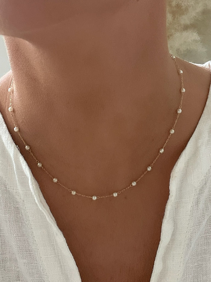 Pearl Chain Necklace by Dylan Rae Jewelry, showcasing delicate pearls on a gold-filled chain, exuding timeless elegance and versatility for any occasion.
