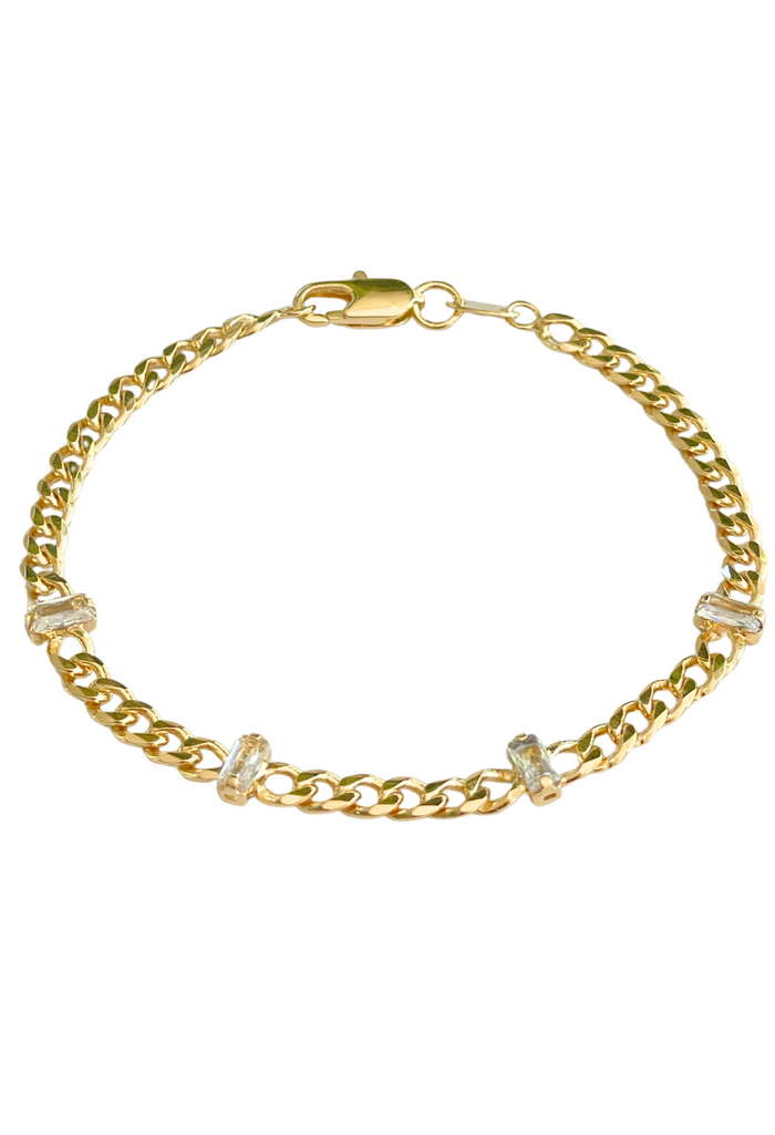 A fresh take on timeless sparkle—our CZ curb bracelet blends everyday shine with statement-worthy style. Perfect for stacking or wearing solo, it’s your go-to for both daily wear and special occasions.


18k Gold Filled Over Brass
7” Length, 4mm Width&nbsp;
Lightweight &amp; Stackable