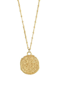 Designed to feel like a found vintage treasure, this 18k gold filled Saint Benedict coin hangs from a double satellite chain, making it the perfect dainty gold pendant for everyday wear and effortless layering.