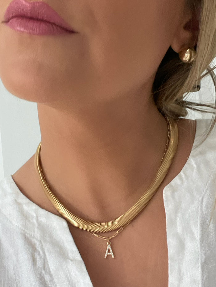 The Slinky Snake Herringbone Chain by Dylan Rae Jewelry, showcasing its elegant 18k gold-filled design.