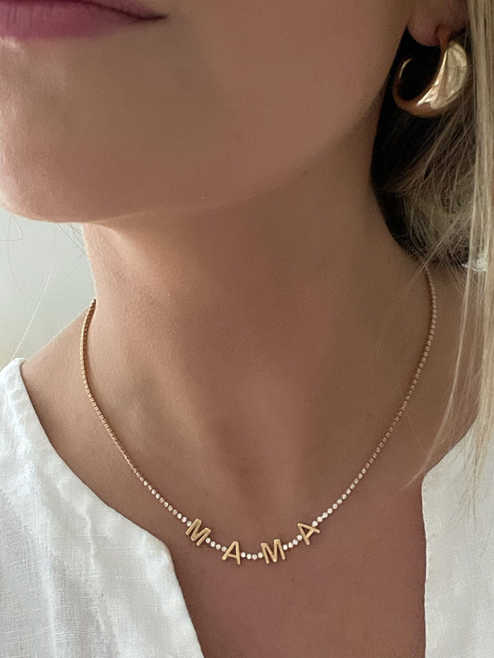 Radiant Mama Tennis Necklace by Dylan Rae Jewelry, crafted with 18k gold filled and sparkling CZ stones.