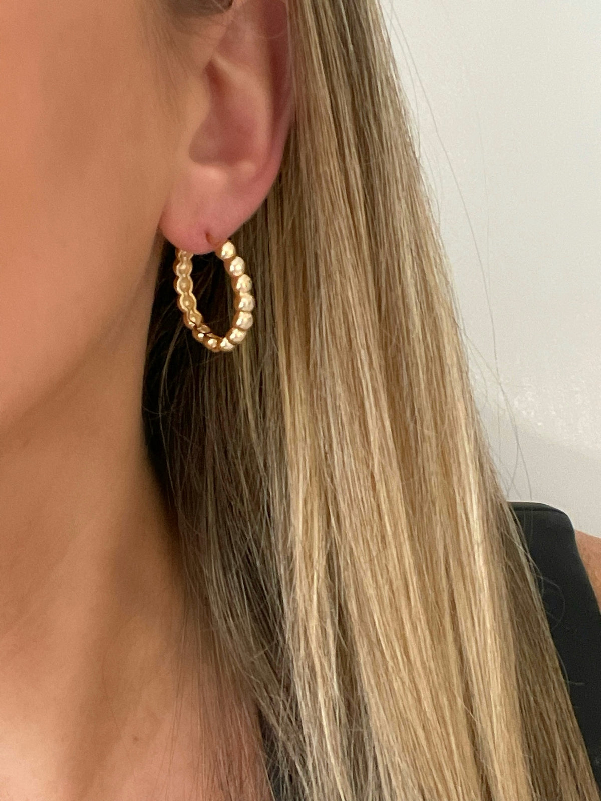 Handcrafted gold hoop earrings with intricate beaded detailing by Dylan Rae Jewelry