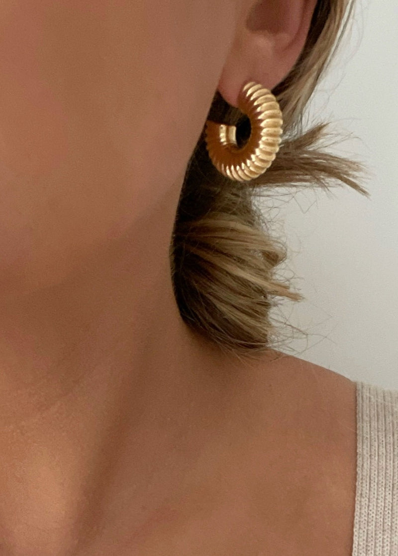 Image: Girls Night Out Chunky Hoops - Gold earrings with ribbed texture, perfect for bold elegance.