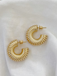 Image: Girls Night Out Chunky Hoops - Gold earrings with ribbed texture, perfect for bold elegance.