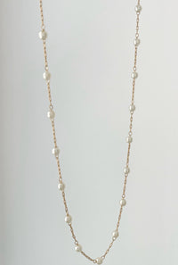 Pearl Chain Necklace by Dylan Rae Jewelry, showcasing delicate pearls on a gold-filled chain, exuding timeless elegance and versatility for any occasion.