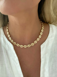 Gold Puffed Mariner Chain Necklace by Dylan Rae Jewelry, showcasing its timeless elegance and versatility. 