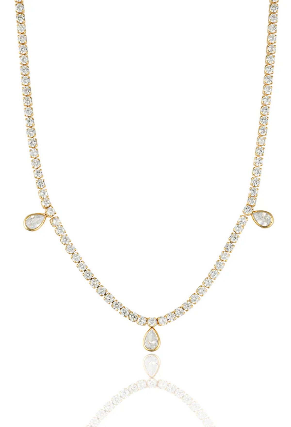 This striking 18k gold-filled tennis necklace is designed to turn heads with its timeless elegance. Crafted with luminous cubic zirconia stones and featuring three delicate teardrop CZ accents, it adds just the right touch of sophistication.&nbsp;