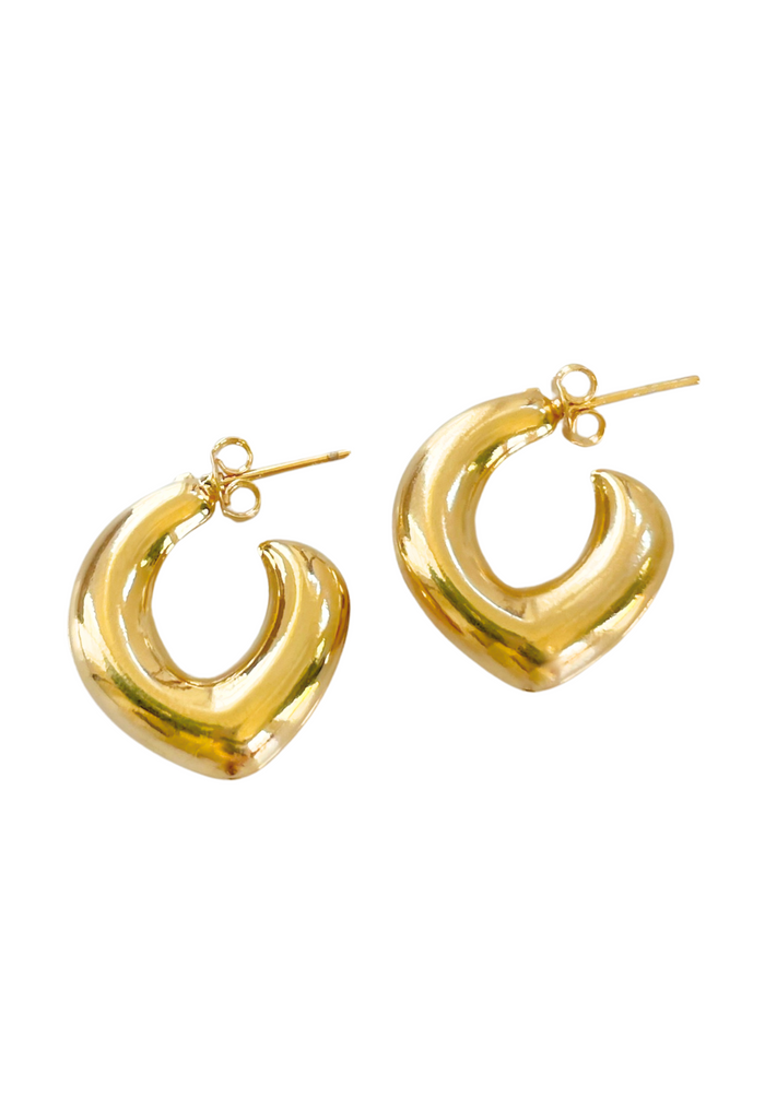 Chunky gold hoops with pointed ends, a versatile statement piece for any occasion