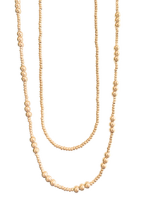 18K Gold Filled Ball Beaded Chains shining in the sunlight, ready to elevate your summer style.