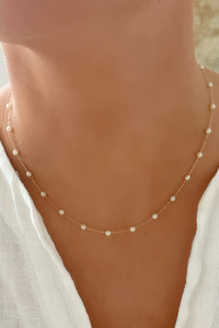 Pearl Chain Necklace by Dylan Rae Jewelry, showcasing delicate pearls on a gold-filled chain, exuding timeless elegance and versatility for any occasion.