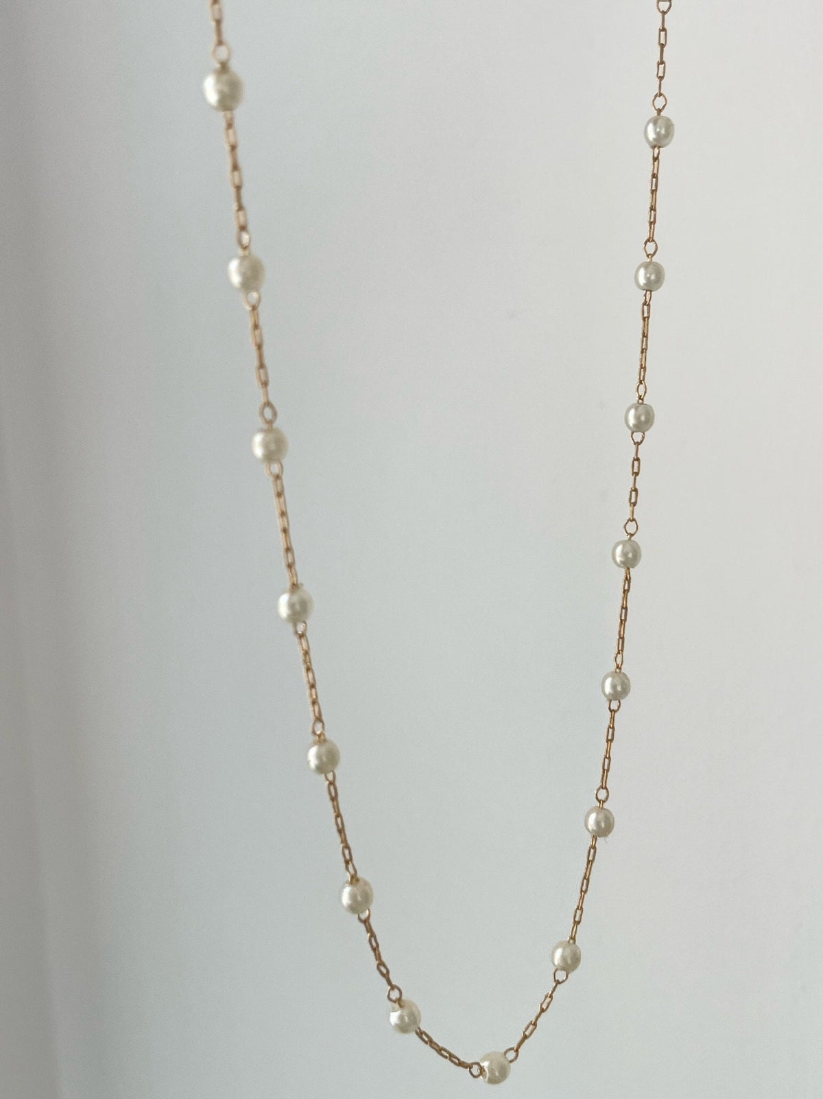 Minimalist Pearl Necklace Delicate Gold Filled Chain Dainty Jewelry Design Floating Pearl Style Everyday Layering Necklace Simple Elegant Accessory Tiny Pearl Beads Feminine Jewelry Collection Premium Quality Craftsmanship Beautiful